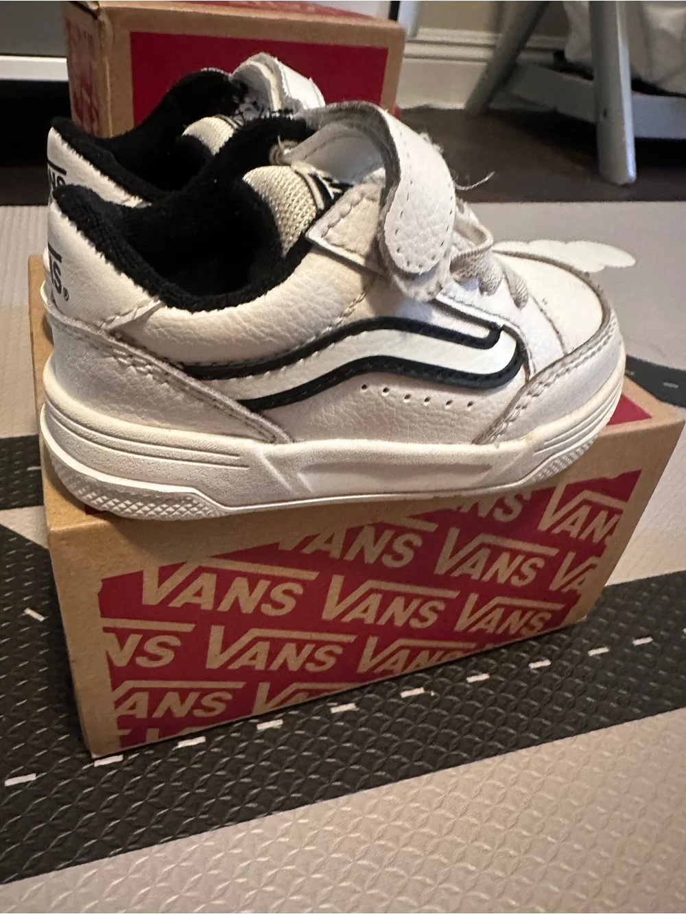 Vans Kids White Sneakers with Black Stripe
